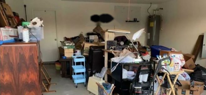 Garage filled with boxes and clutter before reset
